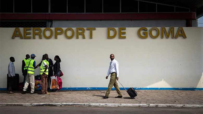 Travellers outside Goma airport