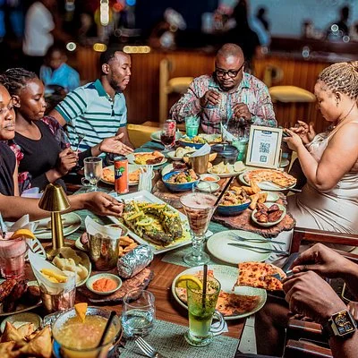 Group dining together in Kinshasa